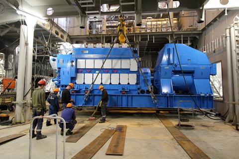 Installation of the third of the six main gensets on the newbuild at the Ulstein yard. (Credit: Ulstein Verft).